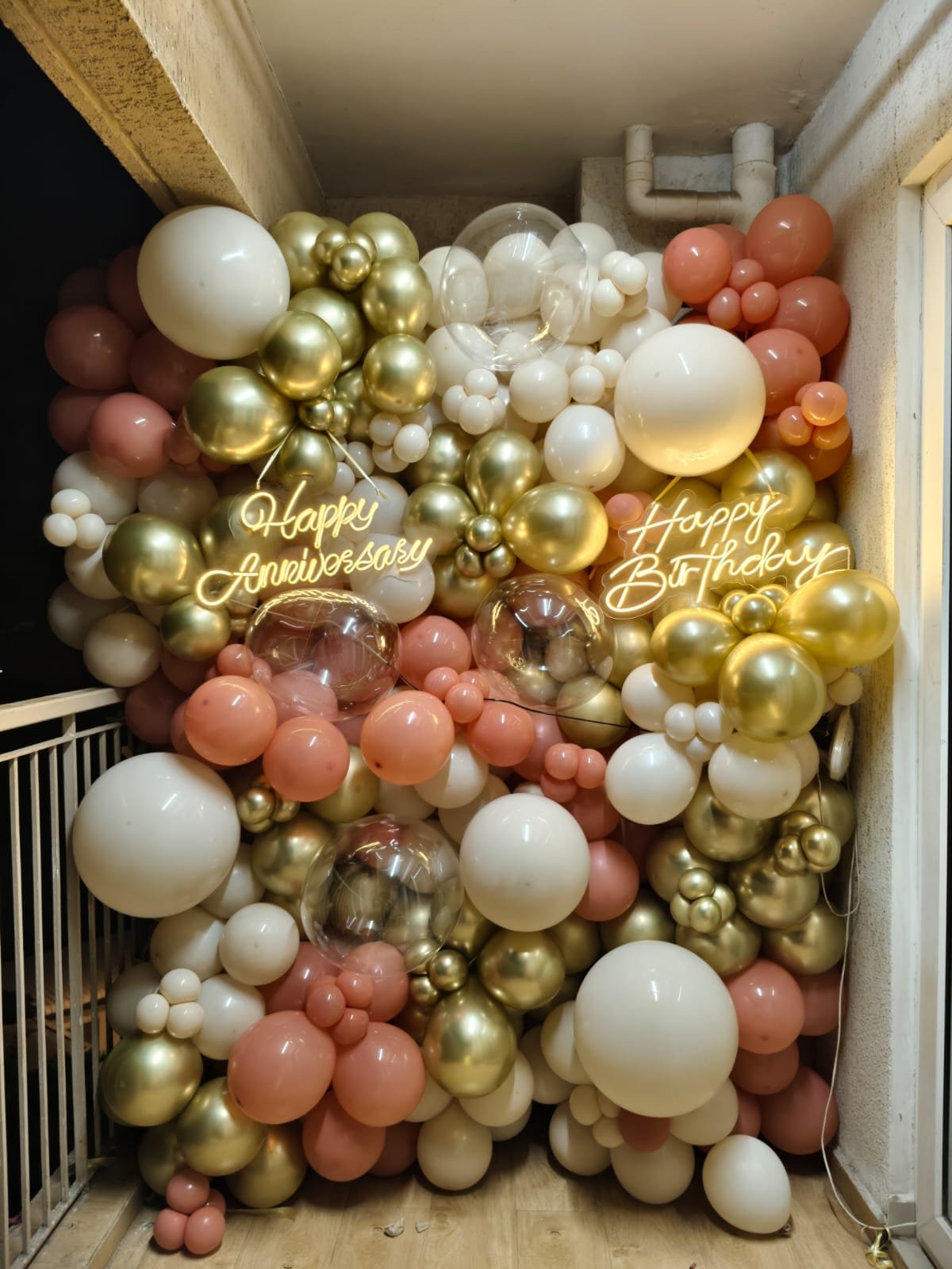 Luxury Metallic Gold & Peach Balloon Wall with Neon Lights balloon decoration inspiration